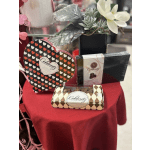 Chocolate gift boxes with a small potted succulent arrangement