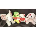 Four plush animals holding heart-shaped pillows on a dark background.