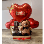 Anniversary gift: teddy bear, box of Ferrero Rocher chocolates, balloons