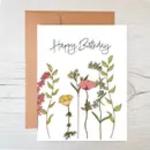 Birthday card with watercolor flowers and leaves
