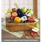 Wicker gift basket filled with fruit, cheese, chocolates, nuts and a sparkling beverage bottle