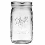 Clear glass mason jar with a metal lid