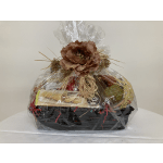 Gift basket wrapped in cellophane with a large decorative flower topper