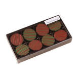 Box of peanut butter cups with red and green drizzle