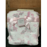 Folded pink-and-white baby blanket tied with a satin ribbon
