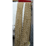 Two long textured floral garlands hang from a rod, one tan and one white.