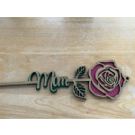 Decorative metal sign with the word Mom and a rose cutout