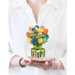 Birthday balloon bouquet in a striped gift box with a green bow