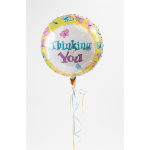 Round foil balloon reading "Thinking of You" with butterfly border and ribbons