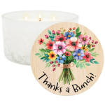 White three-wick candle with a floral thank-you label