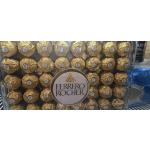 Box of Ferrero Rocher chocolates in gold wrappers