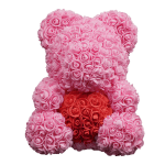 Pink rose teddy bear with a red rose heart on its chest