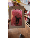Pink rose-shaped teddy bear in a gift box with a ribbon