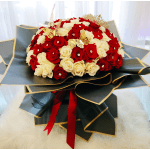 Bouquet of red and white roses with gold butterfly accents