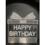 Birthday gift bag with a bow and the words Happy Birthday