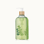 Green eucalyptus body wash bottle with a pump dispenser