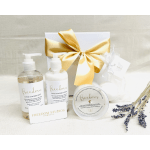Gift set with soap, lotion, candle, and a ribboned box