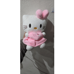 Hello Kitty plush toy holding a pink heart