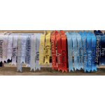 Assorted memorial satin ribbons in various colors with relationship titles printed on them