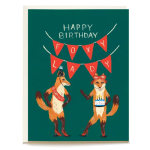 Birthday card with two foxes under bunting and a cake