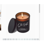 Lit amber jar candle labeled "Date Night" with a black lid