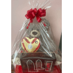Gift basket with teddy bear and heart-shaped chocolate box wrapped in clear cellophane