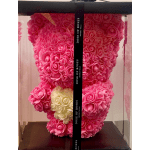 Pink rose teddy bear in a clear display box