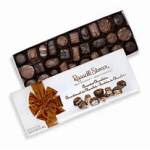 Box of assorted chocolates with a ribbon bow