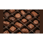 Box of assorted chocolate truffles in a divided tray