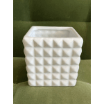 White geometric ceramic planter with a square opening