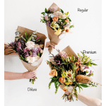 Three wrapped bouquets of mixed flowers in different sizes