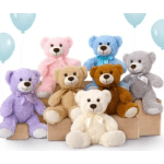 Six pastel teddy bears arranged on boxes with light blue balloons in the background.