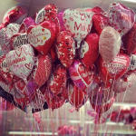 Cluster of heart-shaped Valentine's Day balloons in pink and red