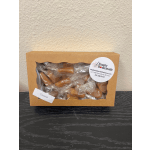 Box of caramel candies in clear plastic wrapping