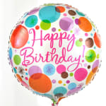 Round birthday balloon with colorful polka dots and pink text