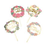 Four floral birthday cake toppers with gold script and pastel flowers
