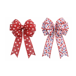 Two decorative heart-pattern ribbon bows on a white background