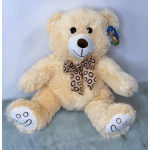 Cream teddy bear with a patterned bow tie