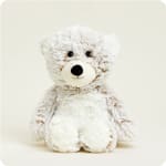 Plush white teddy bear with black eyes and nose