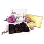 Boxes of chocolates with decorative roses and carnations