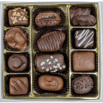 Box of assorted chocolate truffles in gold paper cups