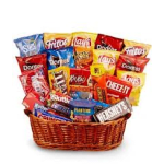 Basket filled with assorted snack bags and candy boxes