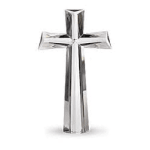 Silver cross-shaped decorative object on a white background