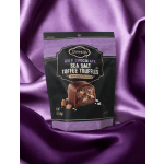 Bag of milk chocolate sea salt toffee truffles on purple satin