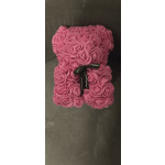 Pink rose-shaped teddy bear with a black ribbon bow