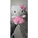 Hello Kitty plush toy in a pink dress with a flower headpiece