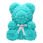 Turquoise teddy bear made of roses with a ribbon bow
