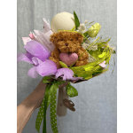 Teddy bear bouquet with purple feathers and a white balloon