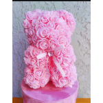 Pink rose teddy bear with a ribbon bow