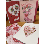 Assorted Valentine’s Day greeting cards with hearts and pink designs